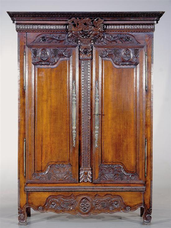 Appraisal: French carved oak armoire th century molded cornice with carved