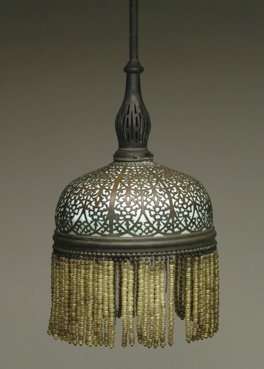 Appraisal: BRONZE BLOWN-OUT HANGER Wonderful hanging lamp has bronze pierced-work shade