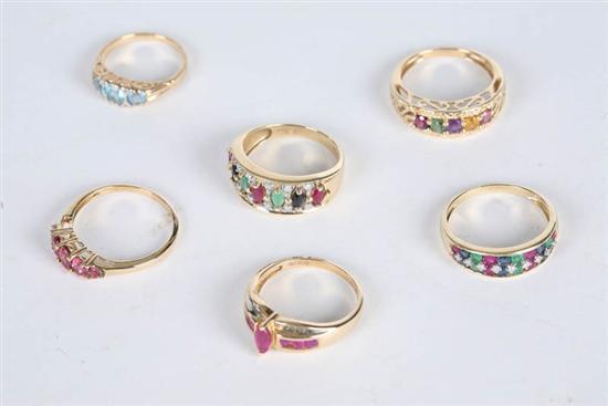 Appraisal: SIX GOLD RINGS Two with diamond chips all with various