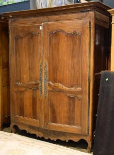 Appraisal: French Provincial two door armoire circa executed in walnut and