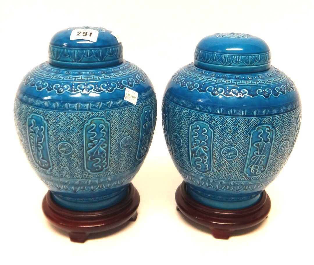 Appraisal: A pair of Chinese turquoise glazed porcelain jars and covers