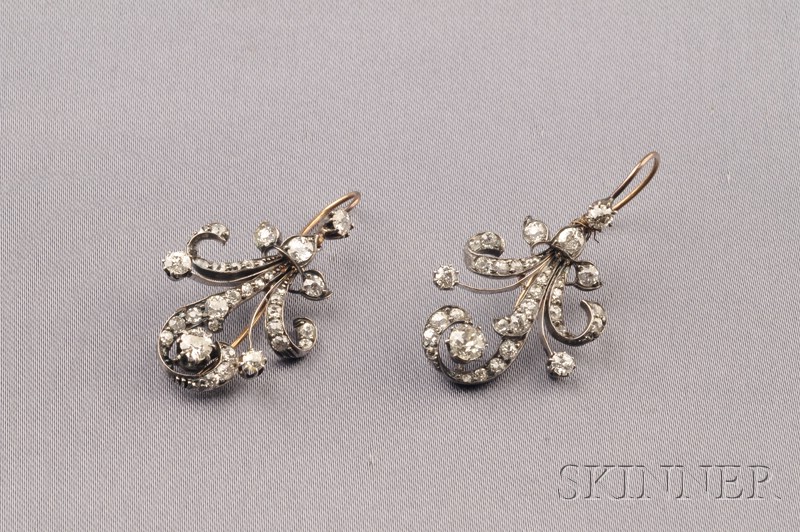 Appraisal: Diamond Earpendants of antique elements each scrolling foliate form set