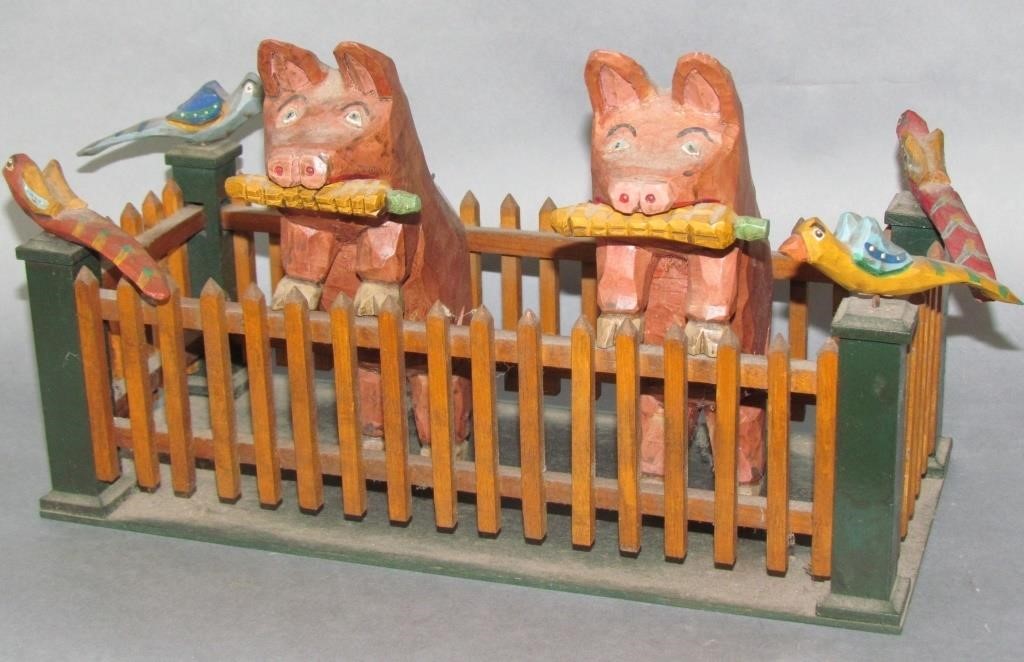 Appraisal: TIMOTHY STRAWSER FOLK ART PIG PENpair of pigs contained within