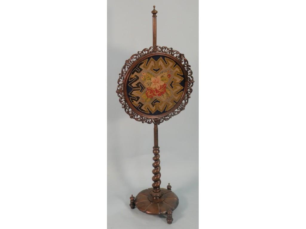 Appraisal: A William IV rosewood pole screen the circular banner inset