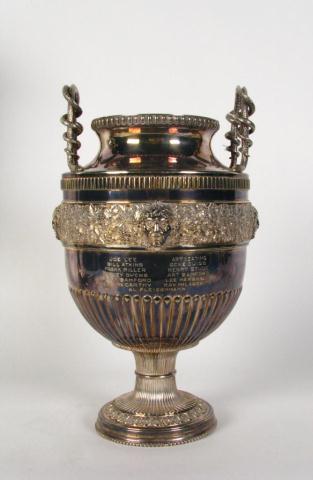 Appraisal: Silver Plated Presentation Urn with serpent handles and figural portrait