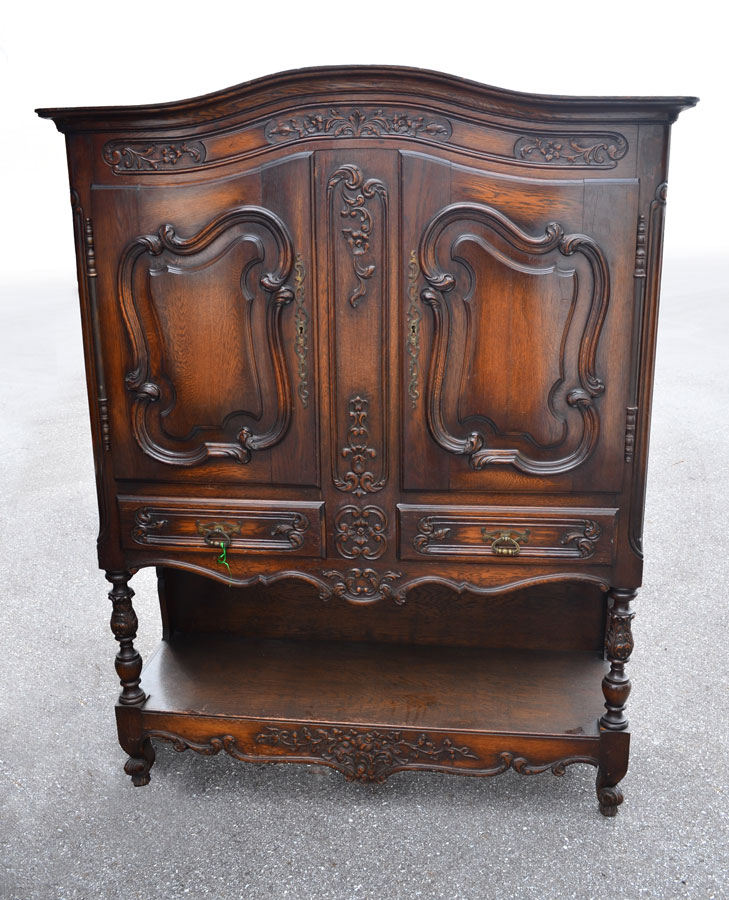 Appraisal: FRENCH CARVED SIDE CABINET Carved all over shaped top over