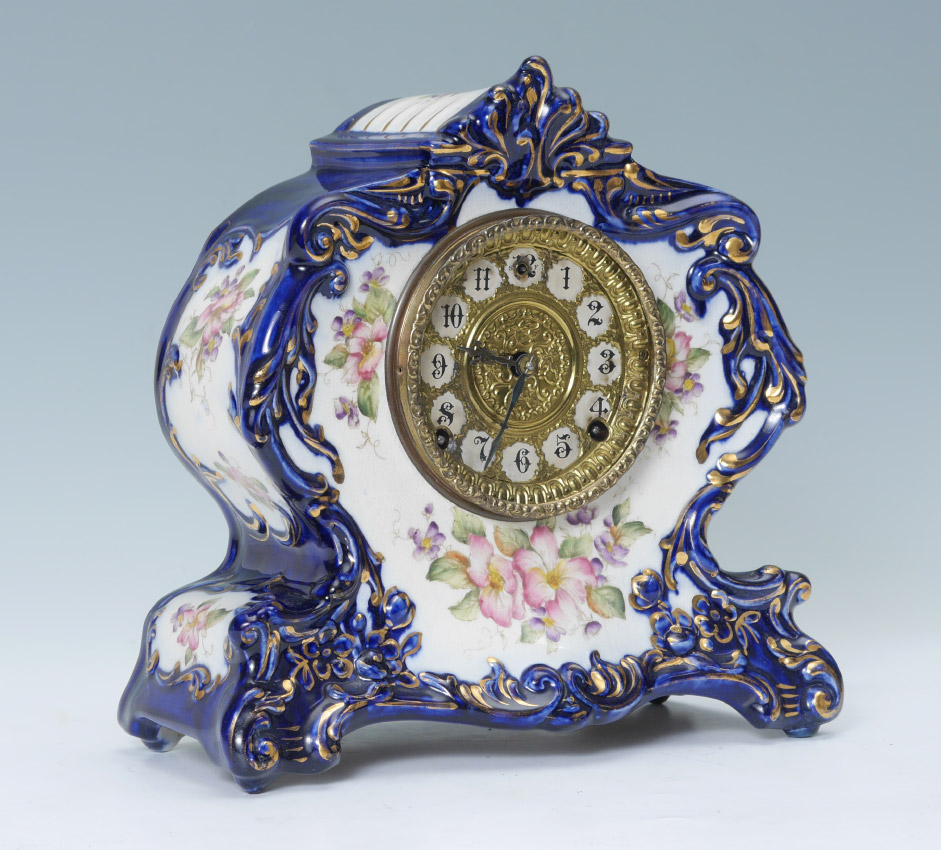 Appraisal: GILBERT PORCELAIN CASE MANTLE CLOCK Case embossed cobalt blue with