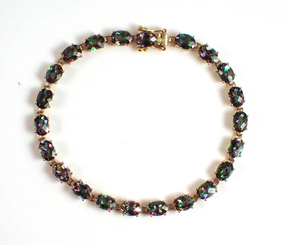 Appraisal: MYSTIC TOPAZ AND FOURTEEN KARAT GOLD BRACELET measuring in length