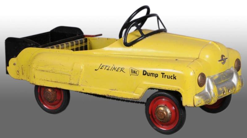 Appraisal: Pressed Steel BMC Jetliner Dump Truck Pedal Car Description Chain