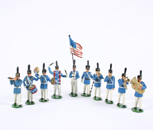 Appraisal: Set painted cast metal marching band with standard bearer Tallest