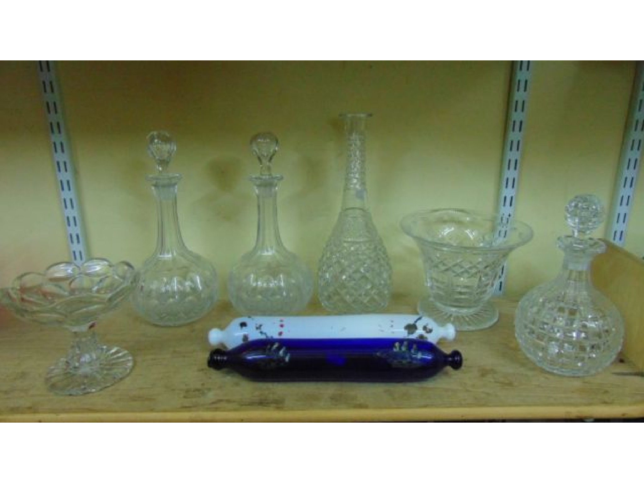 Appraisal: A pair of good quality clear cut glass shaft and