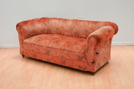 Appraisal: A late Victorian upholstered Chesterfield sofa