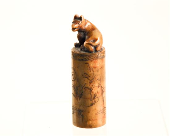 Appraisal: An Asian Carved Stone Seal with a fox dog finial