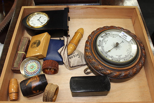 Appraisal: A VICTORIAN OAK ANEROID BAROMETER the white dial and rope