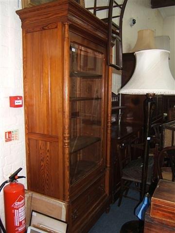 Appraisal: A late th Century French pitch pine bookcase cabinet with