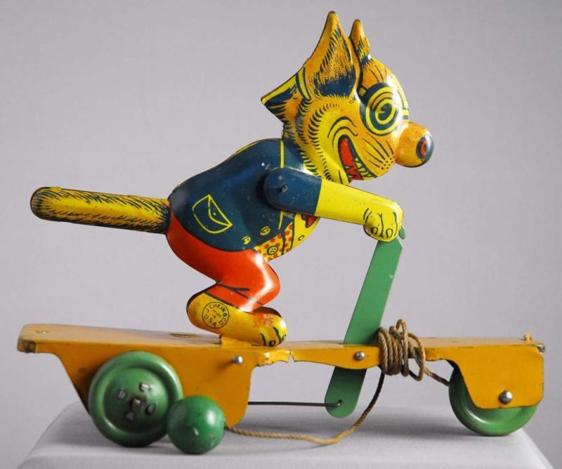 Appraisal: Tin Litho Chein Crazy Cat Scooter Pull Toy Description Marked