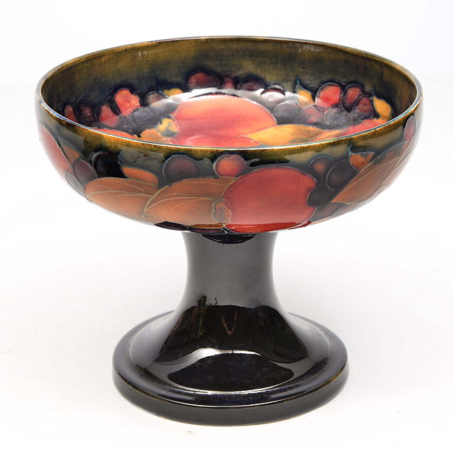 Appraisal: A MOORCROFT POTTERY BOWL on a spreading foot decorated with