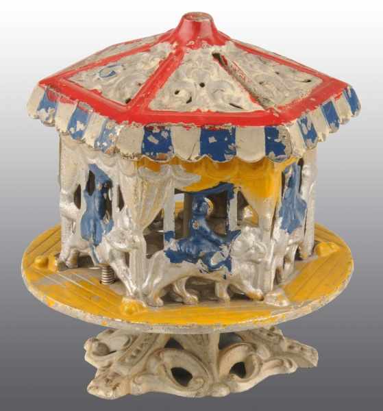 Appraisal: Painted Cast Iron Merry-Go-Round Still Bank Description Manufactured by Grey