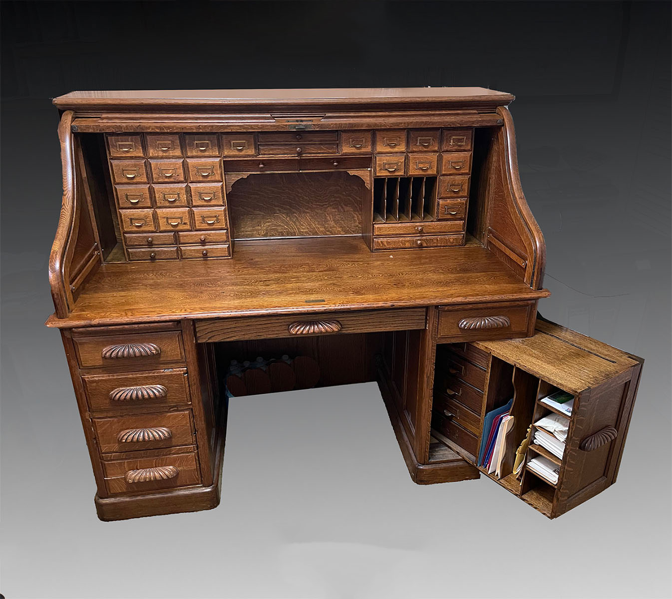 Appraisal: OAK ROLL TOP DESK S-roll top oak desk having an