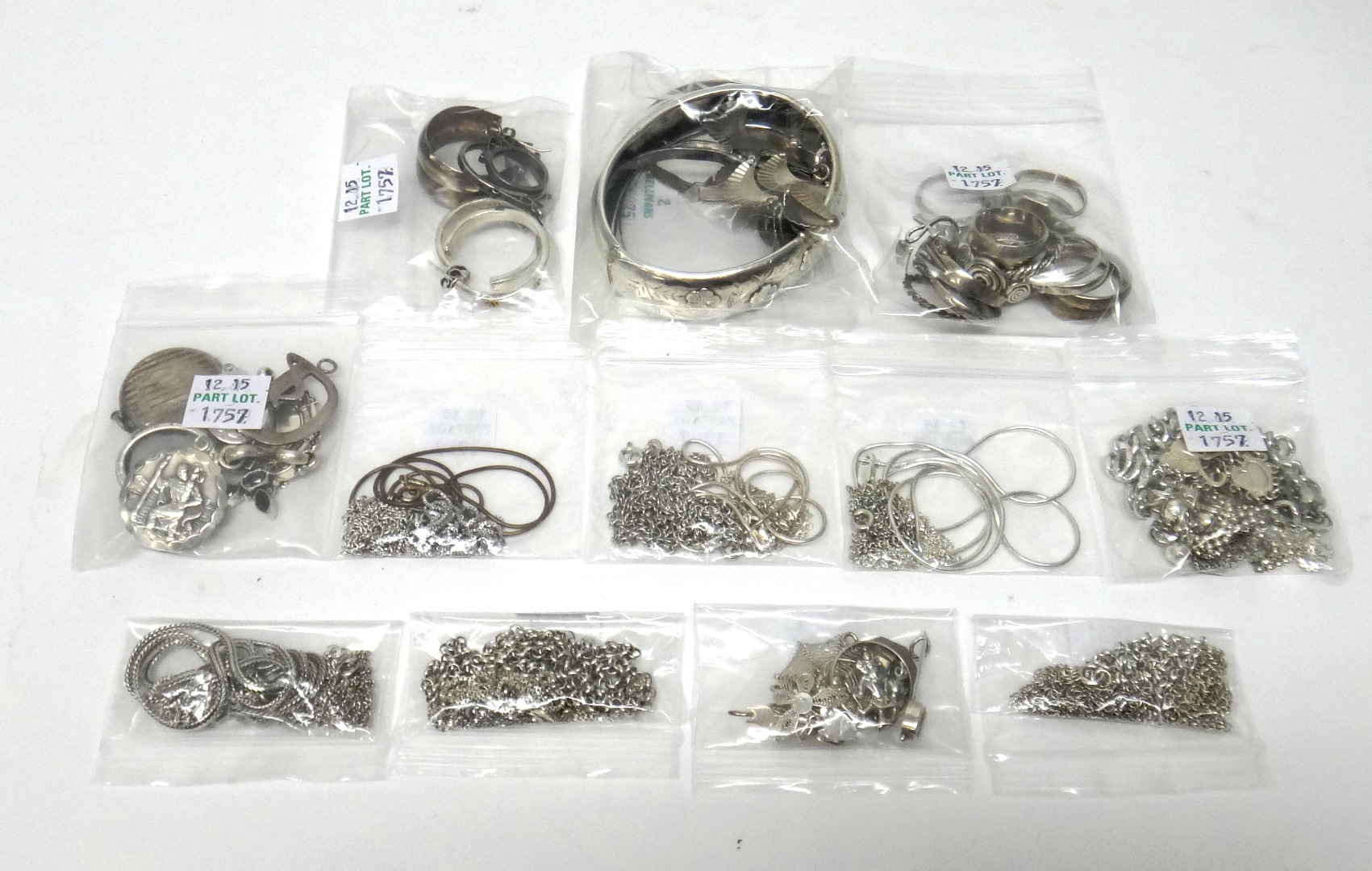 Appraisal: Mostly silver jewellery comprising fourteen rings an oval bangle on