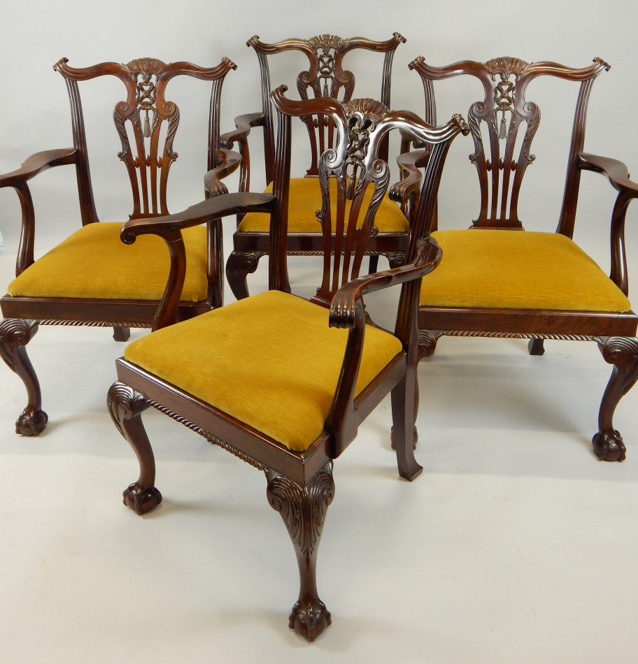 Appraisal: A set of four George III style mahogany open armchairs