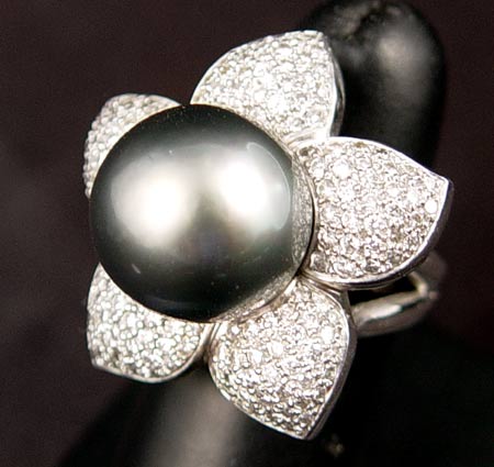 Appraisal: TAHITIAN BLACK CULTURED PEARL AND DIAMOND FLOWER FORM RING K