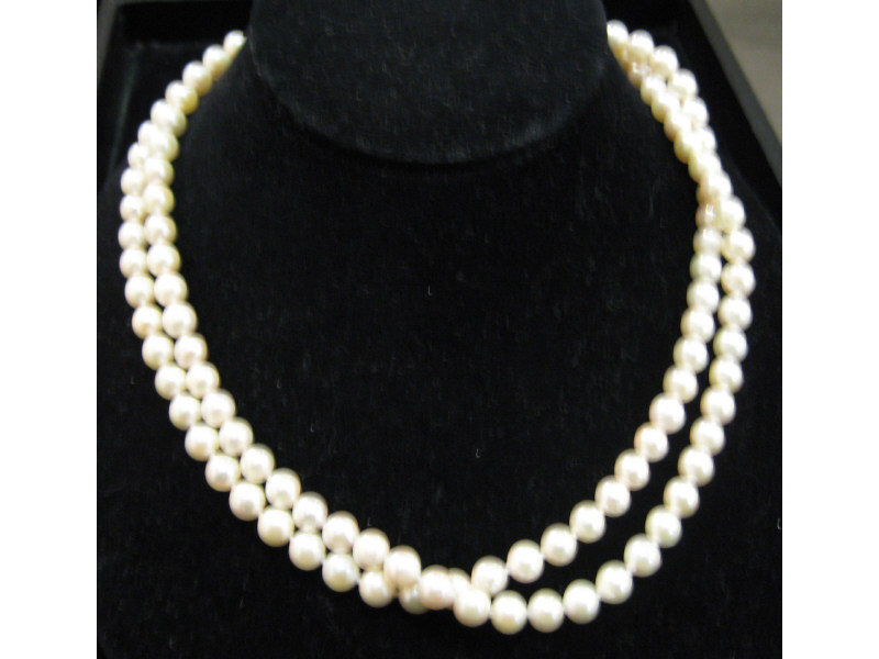 Appraisal: CULTURED PEARLS - mm semi-baroque necklace with k gold clasp