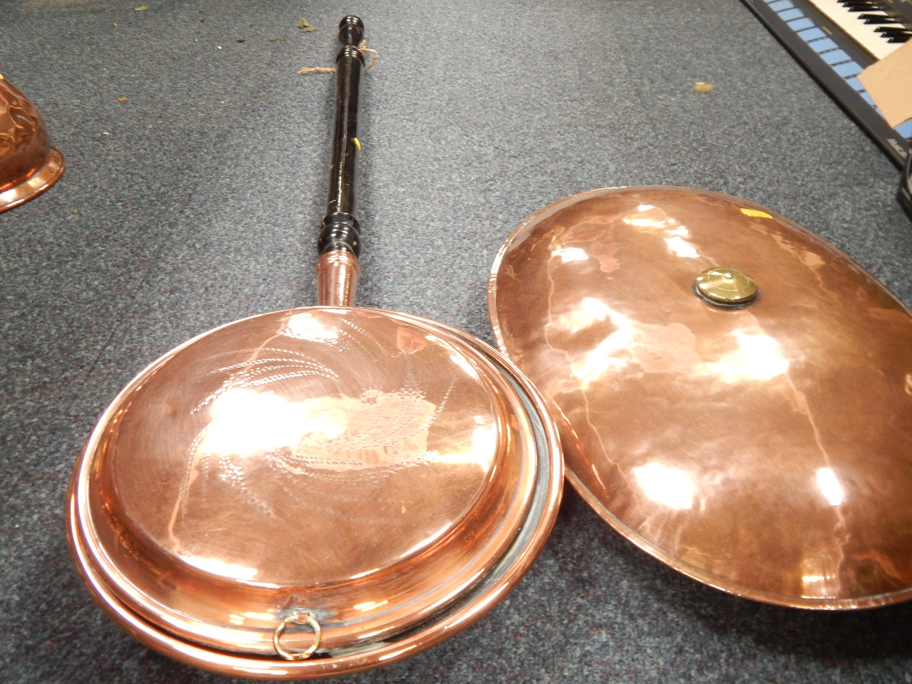 Appraisal: A Victorian copper warming pan and copper foot warmer