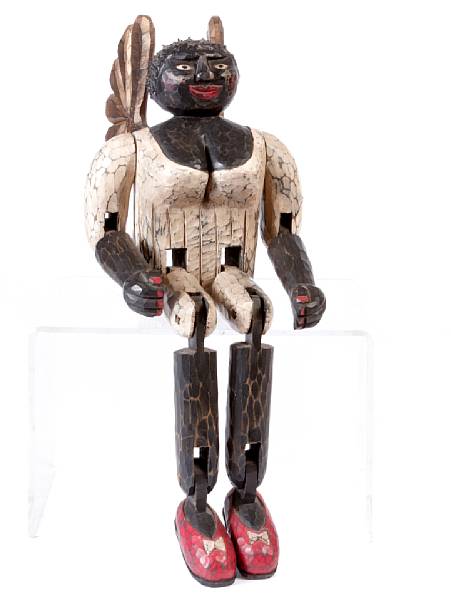 Appraisal: A Folk Art wood carving by Shane Campbell a figure