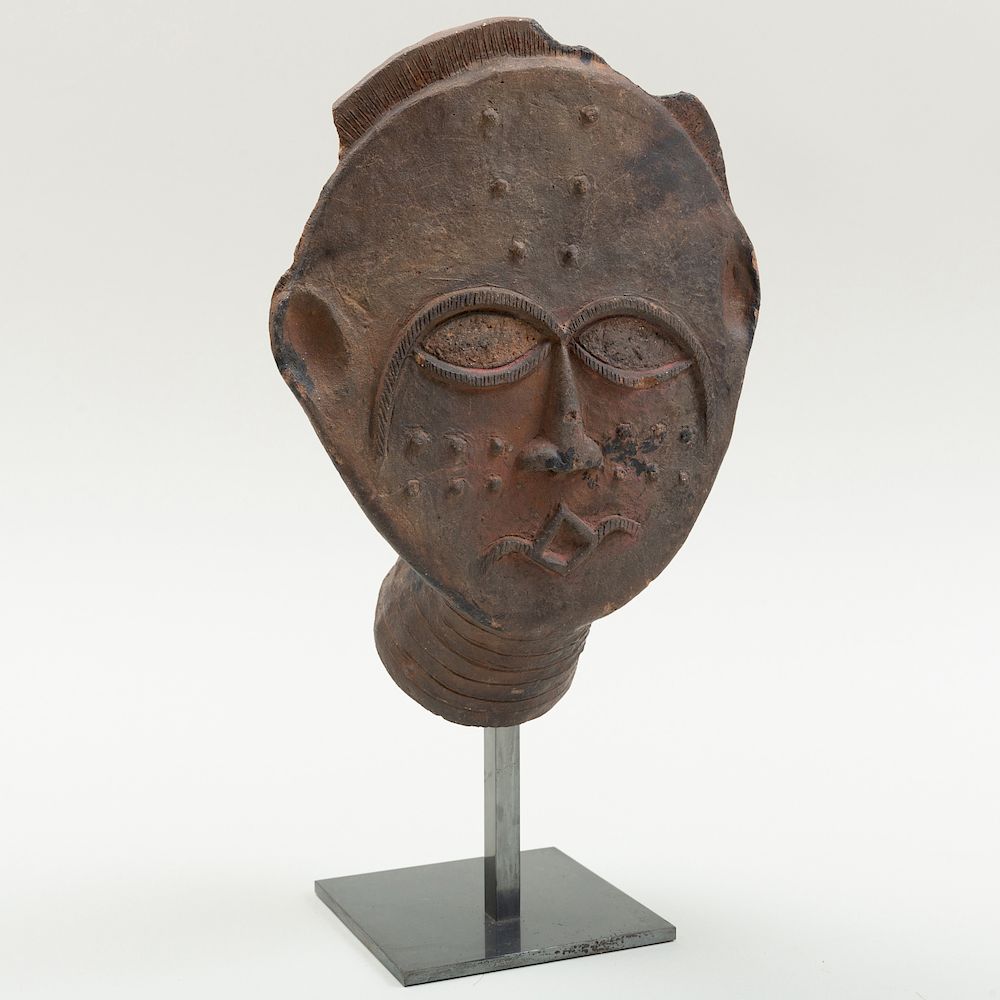 Appraisal: Akan Pottery Mask Ghana Now raised on a stand x