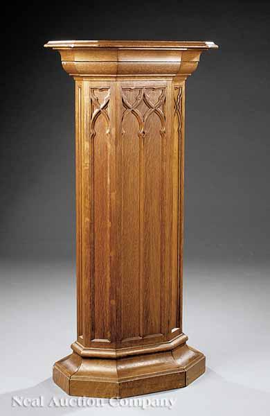 Appraisal: An Antique American Gothic Carved Oak Pedestal revolving rectangular top