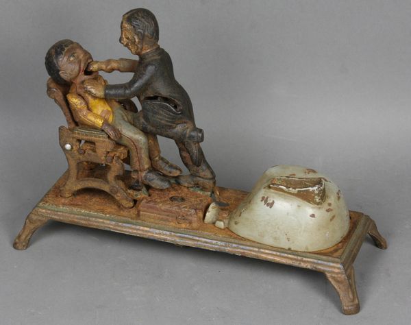 Appraisal: Circa cast iron mechanical bank The Dentist by J E