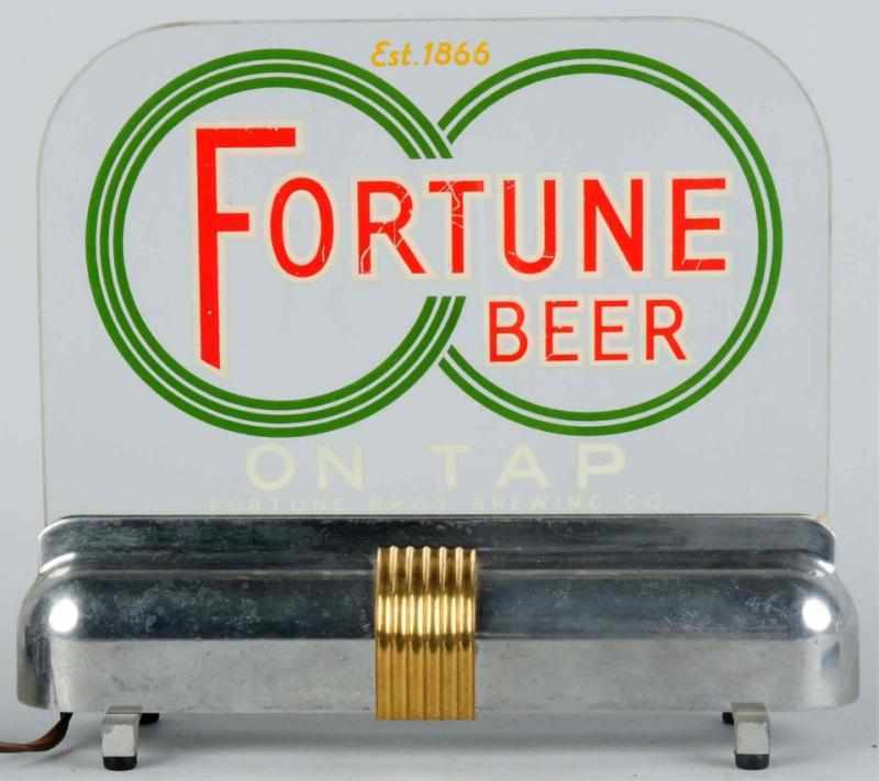 Appraisal: Fortune Beer Reverse Glass Embossed Light-Up Sign Glass is in