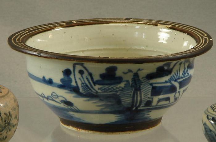 Appraisal: Chinese porcelain bowl with blue white landscape decoration unglazed interior