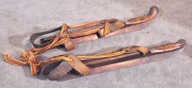 Appraisal: Pair of Scandavian Ice SkatesWood and iron with leather straps