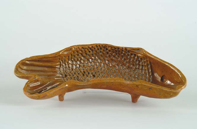 Appraisal: REDWARE GLAZED FISH MOLD Curved fish with scaled center and