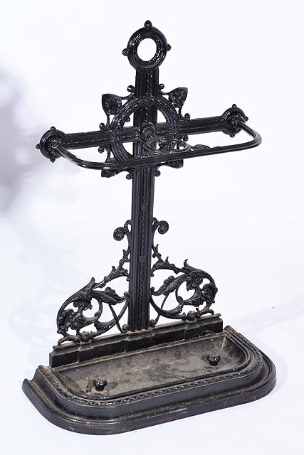 Appraisal: A VICTORIAN CAST IRON UMBRELLA STAND black painted with shaped