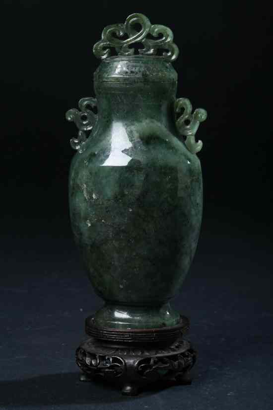 Appraisal: CHINESE SPINACH JADE VASE AND COVER Of shield-form with foliate