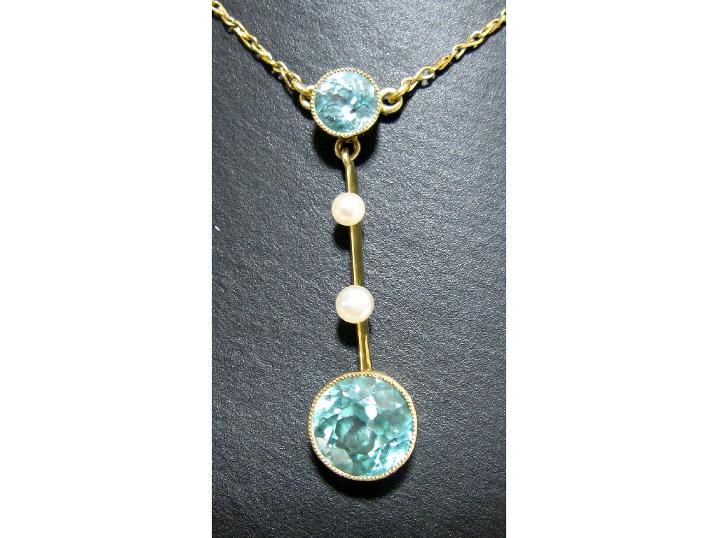 Appraisal: Edwardian gold blue topaz and seed pearl pendant necklace