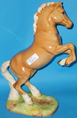 Appraisal: Beswick Palomino Rearing Welsh Cobb restored ears