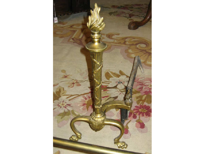 Appraisal: BRASS FIREPLACE GARNITURE Including a large fender and pair of