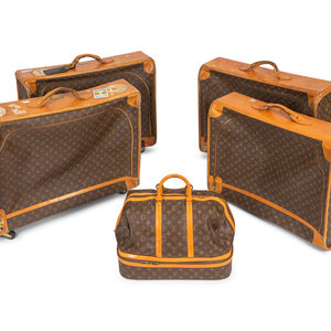 Appraisal: Five Louis Vuitton Suitcases Comprising three soft garment bags on