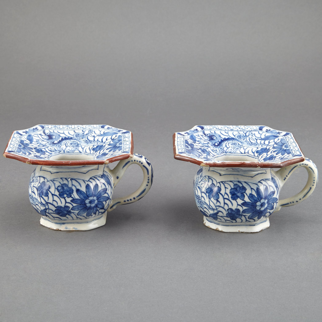 Appraisal: Pair of Delft Spittoons th Century Each of bulbous form