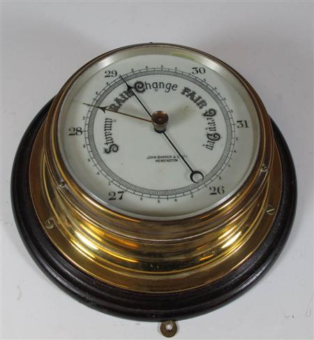 Appraisal: A th century brass ship's barometer Marked John Barker Co