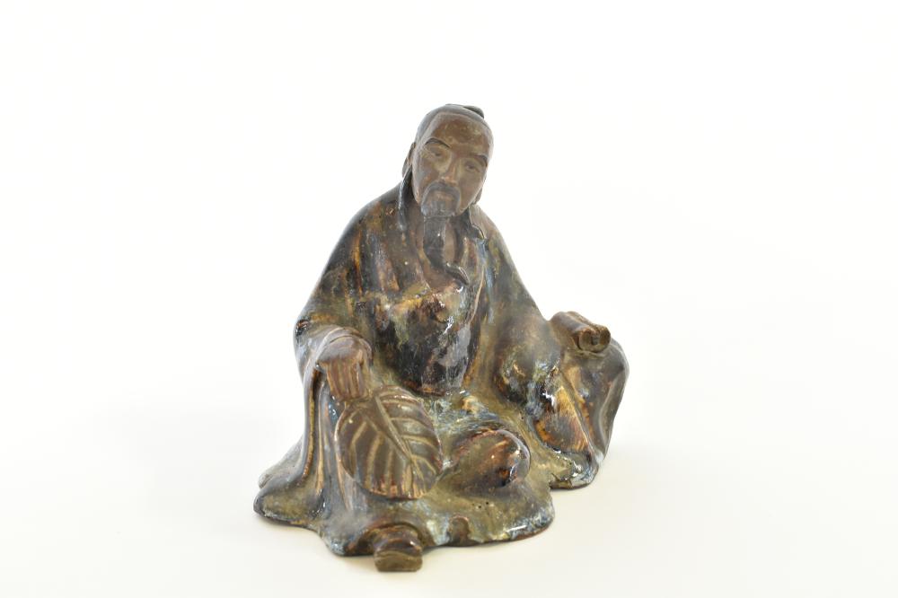 Appraisal: JAPANESE SUMIDA GAWA POTTERY FIGUREEdo Meiji Period Depicting a seated