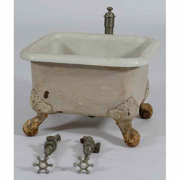 Appraisal: Footbath Porcelain foot bath with claw feet ht wd dp