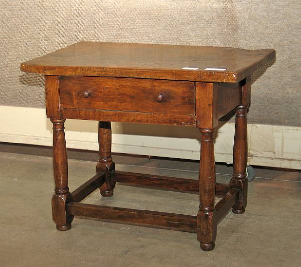 Appraisal: A Baroque style walnut side table partially composed of antique