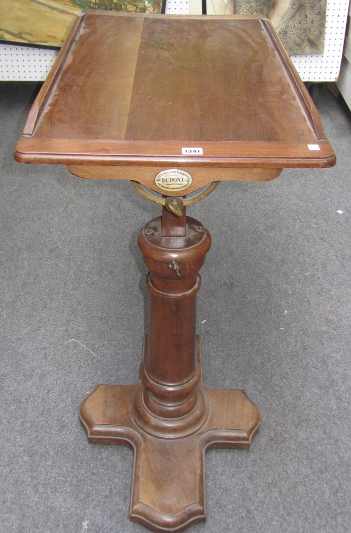 Appraisal: A late th century walnut height adjustable bed reading table