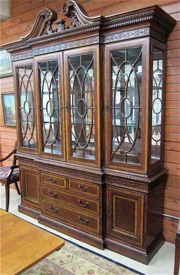 Appraisal: CHIPPENDALE STYLE MAHOGANY BREAKFRONT CHINA HUTCH in two sections top