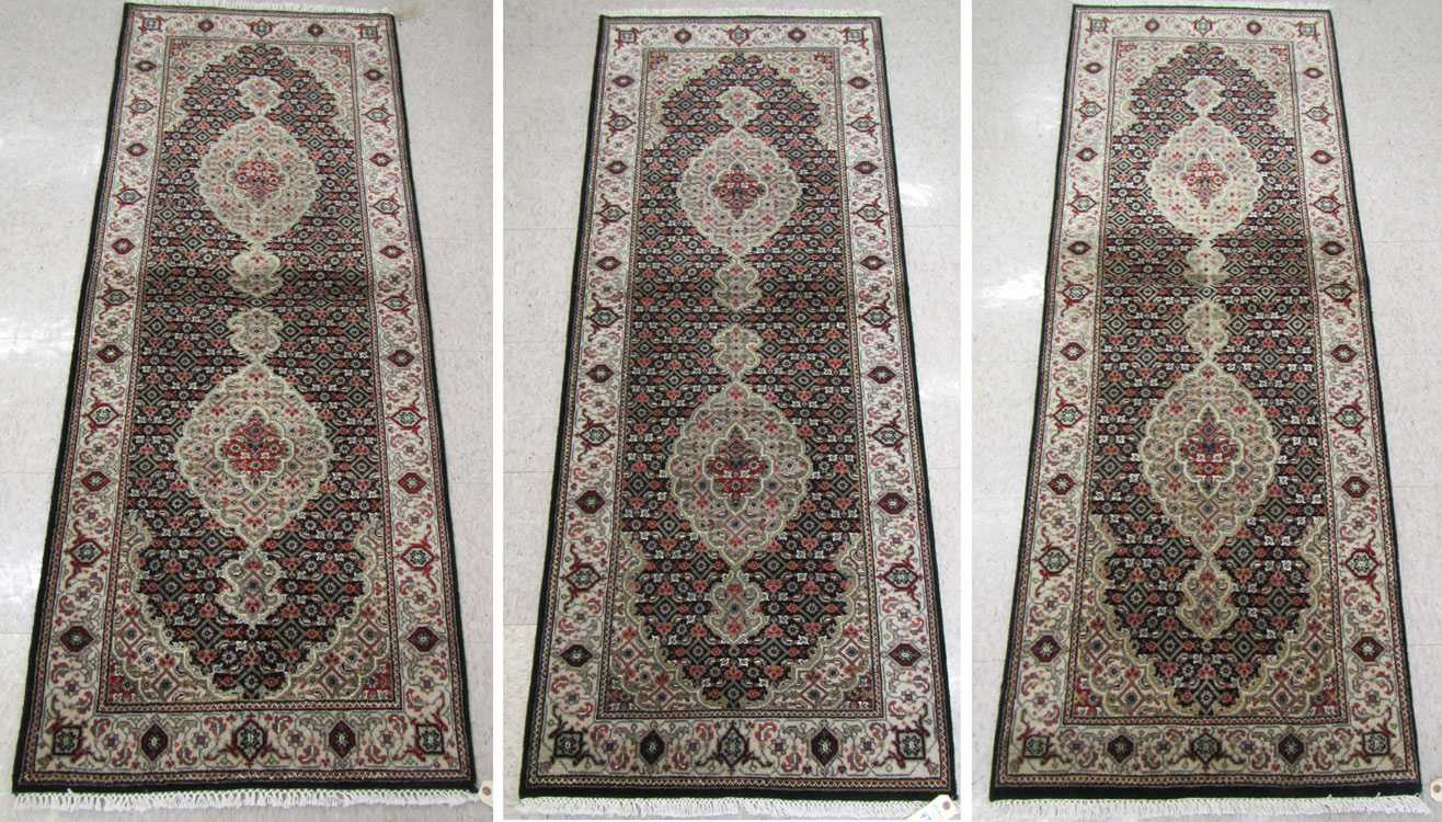 Appraisal: A SET OF THREE HAND KNOTTED ORIENTAL AREA RUGS Indo-Bijar